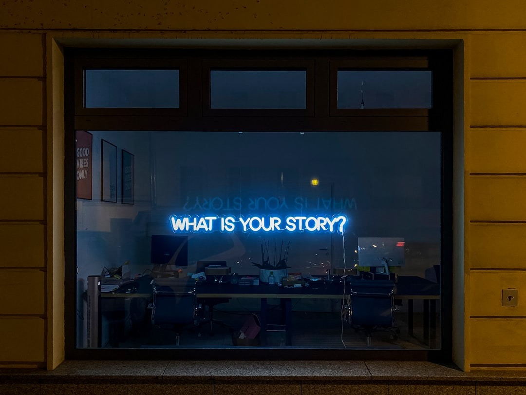 neon sign in office window